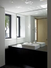 En Suite To The Master Suite With Black Ash Vanity Unit Full Width And Height Mirror And Duravit Basin Apartment Design Bathroom Mirror Vanity Units