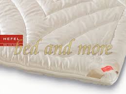 If the dimensions of the washing machine permit, then this is the simplest method. Hefel Year Round Blanket Light Pure Camel 131 10