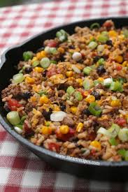 Serve with shredded cheese, sour cream, and cornbread. Tex Mex Beef Skillet I Heart Recipes