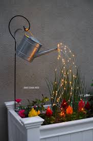 You Ll Need A Drill To Make The Holes A Bit Larger Hide The Remote Inside The Can And Use A Shephard S Hook To Hang I Wasser Leuchten Gartenbeleuchtung Garten