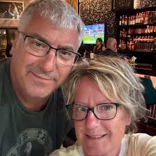 Average January temp and best beach town with bars and shops?