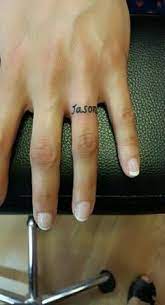 They have matching roman numeral iv tats on their ring fingers.) but since they aren't totally the norm yet, i still tend to think of wedding tattoos as. Wedding Rings Tattoo Color 57 Trendy Ideas Wedding Band Tattoo Wedding Ring Tattoo Name Tattoo On Finger