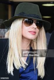 Patty E. King, daughter of B.B. King, holds a flower as she leaves a...  News Photo