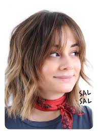 The wispy bangs soften up the front of the cut and look awesome swept to the side along a deep side part. Long Bob With Wispy Bangs Novocom Top