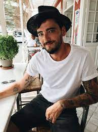 Casual Vacation Look Menstyle Fashion Casual Basic Normcore Hat Plaintshirt Tattoos Tatts Ring Beard Facialh Facial Hair Fall Hair Long Hair Styles