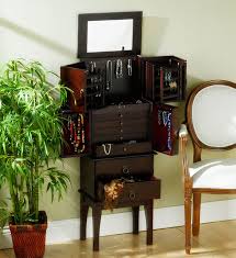 After opening the white case, the box a practical solution for larger bedrooms, this jewelry storage comes with a large door that reveals a functional inside with black velvet backing. Wall Mirror With Jewelry Storage Ideas On Foter