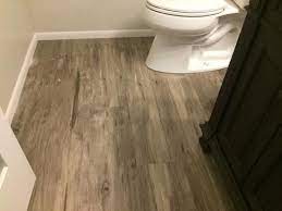 It is perfect for kitchens and bathrooms and comes with a great warranty with a nice variety of color. Lifeproof Rustic Wood Lvp Flooring Floor Remodel Bedroom Flooring