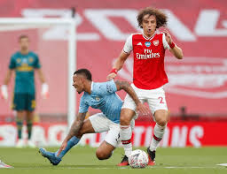 Arsenal celebrate as city slink off. David Luiz Hailed After Manchester City Win