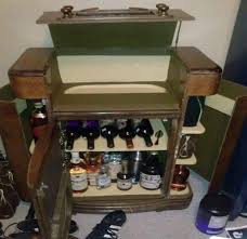 Inside this cabinet you'll be able to house all your wine glasses, tumblers, 6 wine bottles, and a drawer to hold your bottle openers and accessories. 25 Diy Liquor Cabinet Plans You Can Diy Easily