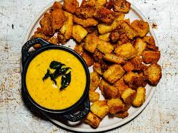Crispy And Fluffy Roasted Potatoes Are The Perfect Partner For Aromatic Curry Leaf Mustard Oil Mayonnaise Serious Eats Roasted Potatoes Curry