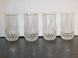 The lead content in our everyday diet and the environment is higher than when we consume from crystal decanters. Vintage Set Of 4 Lead Crystal Clear Highball Water Drink Etsy Lead Crystal Glasses Lead Crystal Crystal Drinking Glasses