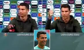 Cristiano ronaldo was far from pleased to see two bottles of coca cola in front of him as he sat for his press conference on monday. 4kkdy03vn98ygm
