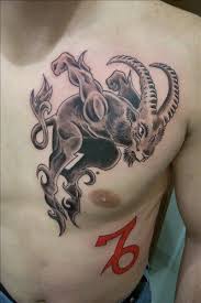 Zodiac Signs Capricorn Tattoo On Man Chest And Side Rib Capricorn Tattoo Tattoos For Guys Capricorn Sign Tattoo
