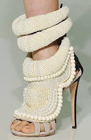A detailed look at the shoe everyone will want on their feet all summer long. Kanye West Shoes Co Designed With Giuseppe Zanotti Featuring Pearl Crochet Detailing Price Tag 6000 Bucks A Giuseppe Zanotti Heels Fashion Heels Zanotti