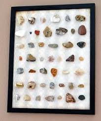 Display gemstones atop a stack of books, amid houseplants or alongside photo frames and mementos. 89 Rock Displays Ideas Displaying Collections Rock Collection Display Rock Collection