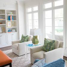 It features a high density. Ivory Linen Accent Chairs With Olive Green Lamp Transitional Living Room
