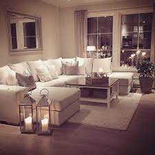 A living room might feel cozy because of its proportions but also because of the way it's furnished with many comfy seats. My Perfect Cosy Living Room Someone Please Buy Me A Sofa Just Like This But Maybe In A More Cosy Living Room Romantic Living Room Cozy Living Rooms
