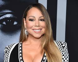 Mariah Carey says she 'grew up thinking hair was supposed to look a certain  way' as a 'mixed-race person'