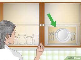 It suits all styles and all kitchen types, some better than others. How To Decorate Kitchen Cabinets With Glass Doors 15 Steps