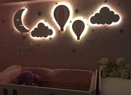 The simplicity creates a calm respite from the chaos of everyday kidness. Set Of 5 Nursery Wall Lights Baby Room Lighting Wooden Etsy Kids Room Lighting Baby Room Lighting Kids Room Wall Decor
