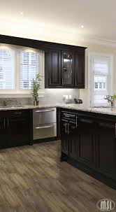 While we still love that look, we'd like you to dip your toe into some darker waters and try a different trend: Kitchen Cabinet Dark Kitchen Cabinets Flooring Ideas Cheap Beautiful Kitchen Design