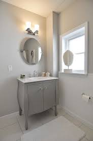Soft Gray Bathroom Cabinet Works Well With The Light Gray Walls And Off White Floor Ti Bathroom Vanity Designs Bathroom Cabinets Designs Custom Bathroom Vanity