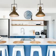 Our kitchen isn't huge, although updates like painting the melamine cabinets white and updating the track lighting made it feel significantly bigger! Free Diy Kitchen Island Plans
