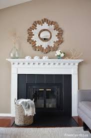 Black And White Tile Fireplace Surround The Living Room Fireplace Is A Favorite Feature In Our House Recently I Gave The Tile Surro Tile Around Fireplace Fireplace Surrounds Paint Fireplace Tile