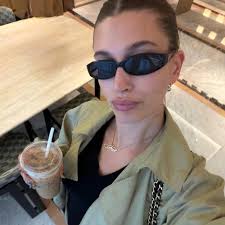 Hailey Bieber's Seoul Style Includes Two Chanel Bags, a Sheer Top, and Her Favorite Heeled Flip-Flops