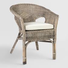 Handwoven Of Graywashed Rattan Fibers Our Tub Chair Brings Country Inspired Charm To Your Living Ar Affordable Dining Room Chairs World Market Furniture Chair
