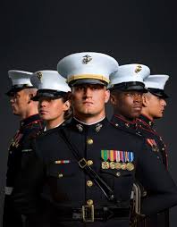 A Group Of Marines Are Shown In Dress Blues Their Medals Illuminated Marine Corps Uniforms Us Marines Uniform Marine Corps