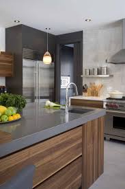 Contemporary Kitchen With Large Island Beautiful Walnut Wood Tones And Dark Countertops Modern Kitchen Kitchen Design Kitchen Inspirations