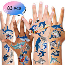 The tattoos that fit on your knuckles are small but powerful, and the beauty lies in the tiny details. Buy Shark Tattoos 83pcs Konsait Ocean Sea Themed Shark Temporary Tattoo Body Stickers Costume Accessories For Baby Boy Girl Birthday Party Favor Supplies Decor Goodie Party Bag Fillers Online In Turkey B07r7lj6rj