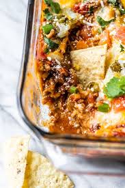 This Baked Mexican Layer Dip Is Filled With Meat Cheese And Tons Of Taco Flavor Recipe Skinny Taste Recipes Mexican Food Recipes Mexican Appetizers
