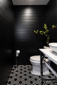 Raised black text over white rectangular base gives it a sleek, chic look. Create A Modern Powder Room Using Black Shiplap Black Powder Room Black Tile Bathrooms White Bathroom Tiles