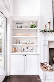 The nice thing about a project like this is that it takes advantage of an enormous amount of wall space that typically goes unused. Diy Living Room Built Ins Domestically Blissful
