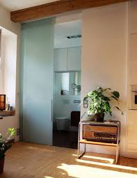 Amazing gallery of interior design and decorating ideas of glass pocket doors in bedrooms, living rooms, decks/patios, dens/libraries/offices, dining rooms, laundry/mudrooms, bathrooms, kitchens, entrances/foyers. Your Best Options When Choosing A Bathroom Door Type