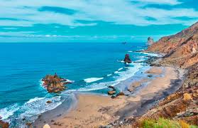 British, nordic and german tourists come in their tens of thousands every year to visit its spectacular beaches and lively nightlife. The Best Natural Sandy Beaches In Tenerife