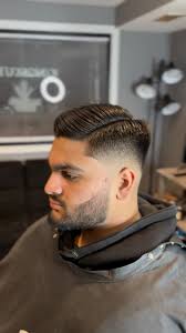 Skin fade with textured top 🔥 Styled with @mukhaircare_usa @john.cerulli  #faded #fadedworld #mensfashion #menshair #menshaircut #barbergang  #behindthechair #menshairstyle #style #fashion #nationalfadeleague  #nationalbarbersassociation #thebarberpost ...