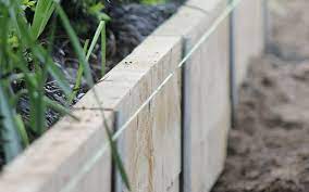The Surewall Retaining Wall Posts Provide A Simple And Easy Solution For Creating Solid Retaining Backyard Fences Retaining Wall Landscaping Retaining Walls