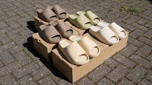 Adidas yeezy slide earth brown fv8425. Yeezy Slide Bone Desert Sand Resin Earth Brown Unboxing On Feet Youtube