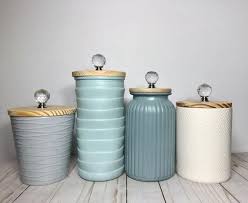 New listingtupperware vtg canister set of 4 white black lids one touch 2~#2709 #2708 #2710. Urban Scandinavian Boho Kitchen Canisters Textured Ceramic Jars In Neutral Blue Gray White Ceramic Kitchen Canisters Kitchen Canisters Boho Kitchen