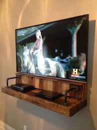 Diy Pallet Wood Floating Tv Shelf Idea That Hides Your Wires Pinteresting Finds Diy Entertainment Center Rustic Tv Stand Wall Mounted Tv