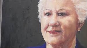 Jenny Hurley chooses which portrait she will take away.