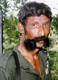 I'm watching a Netflix documentary about a smuggler and murderer in  southern India in the 1980s and 1990s called Veerappan. There are some  absolutely magnificent moustaches