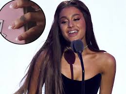 Ariana grande and pete davidson marked their relationship with matching tattoos and ink tributes. Ariana Grande Covered Up The Pete Davidson Inspired Tattoo On Her Finger Insider