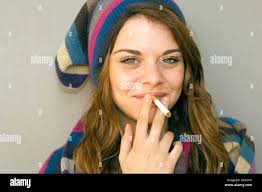 Teenagers smoking cigarettes hi-res stock photography and images