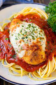 This baked chicken parmesan is one of the yummiest and easiest dinner ideas you'll ever try!! Baked Chicken Parmesan Dinner At The Zoo