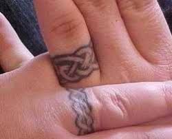 Black And Red Ring Tattoo Tattoo Ideas Wedding Ring Finger Tattoos Tattoo Wedding Rings Ring Finger Tattoos Wedding Ring Finger Tattoos