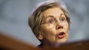 Warren steps up criticism of Powell following rate hike, says he is  'dangerous' to serve as Fed chair